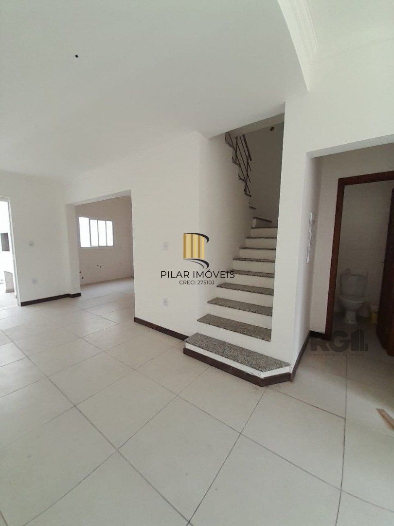 Casa 3 dormitórios no bairro Camaquã