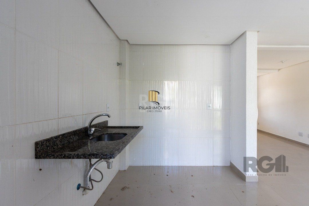 Casa 3 dormitórios no bairro Guarujá