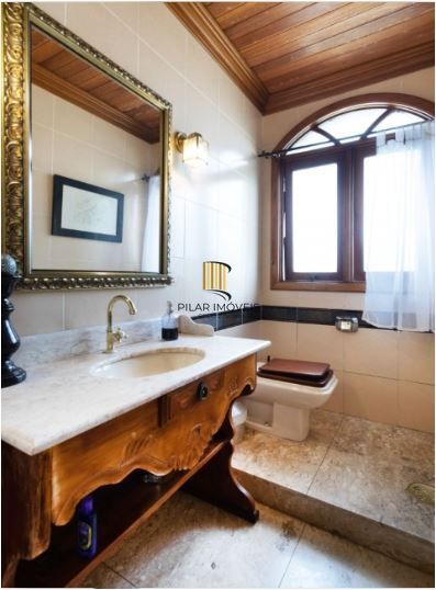 Casa em Condomínio à venda com 5 dormitórios, 565m² e 4 vagas no Condominio Jardim do Sol, Zona Sul de Porto Alegre