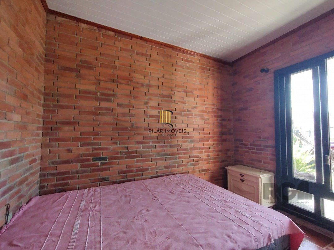 Casa 5 dormitórios no bairro Atlântida