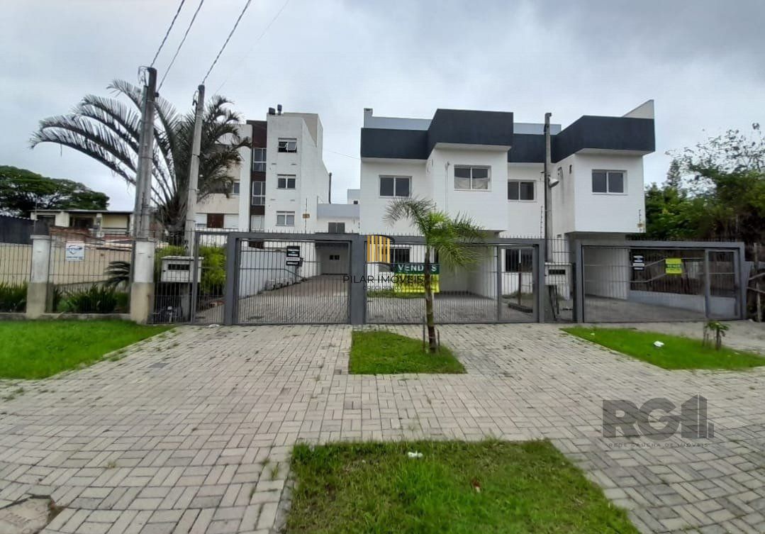 Casa 3 dormitórios no bairro Camaquã