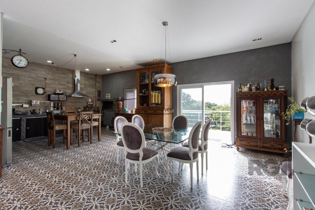 Casa de Condomínio 4 dormitórios no bairro Vila Nova