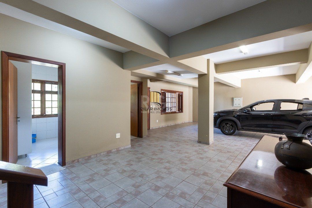 Casa de Condomínio 4 dormitórios no bairro Nonoai