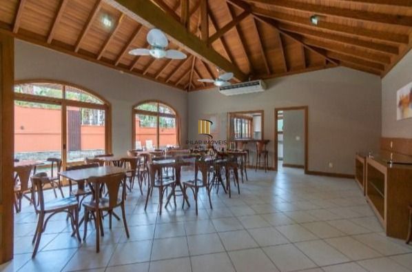 Casa em Condomínio com 487m² | 4 Dormitórios sendo 4 suítes, 3 vagas, no Bairro Três Figueiras, Porto Alegre