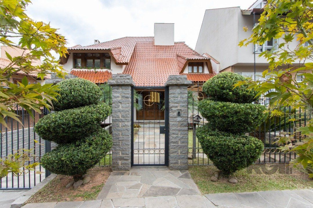 Casa para Venda com 4 dormitórios, sendo 2 suites e 4 vagas no bairro Jardim Isabel