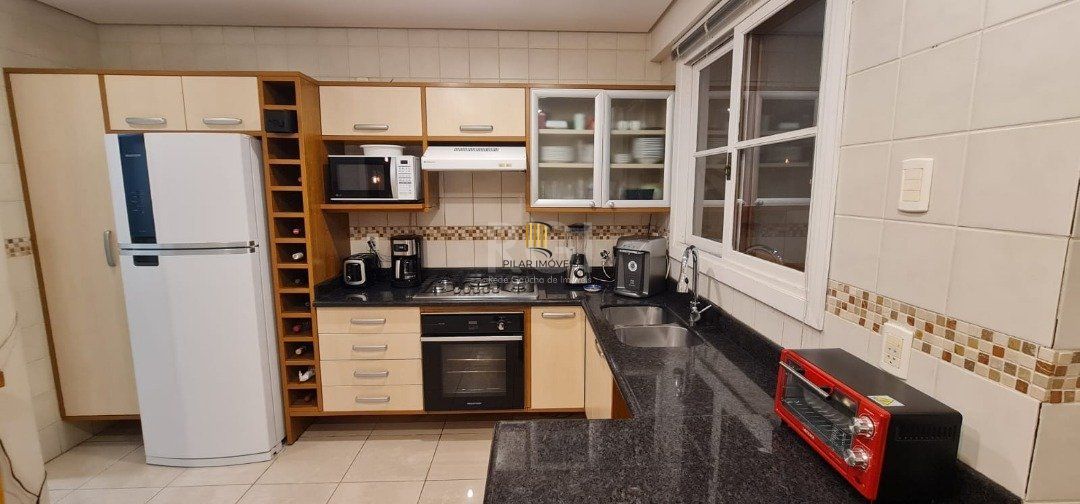 Casa de Condomínio 4 dormitórios no bairro Vila Conceição