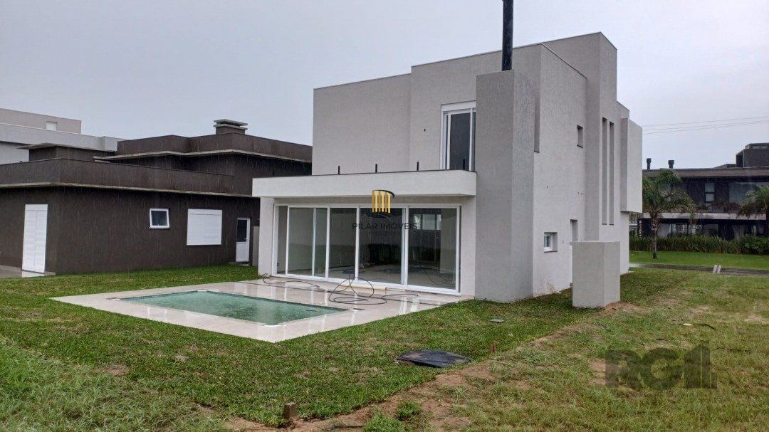 Casa de Condomínio 4 dormitórios no bairro Praia da Conceição
