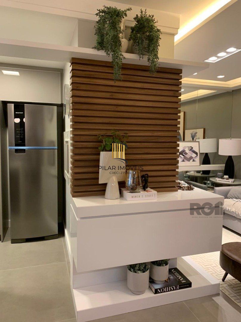 Apartamento belíssimo de 02 dormitórios com garagem coberta.  