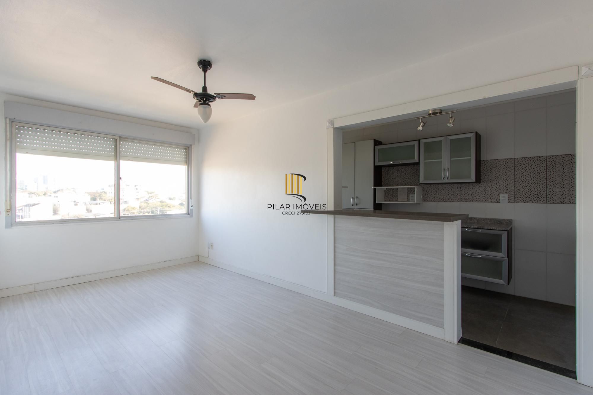 Apartamento semimobiliado à venda no bairro Cristal, 2 dormitórios, 2 banheiros, 1 vaga coberta e vista livre para o Guaíba - Pilar Imóveis