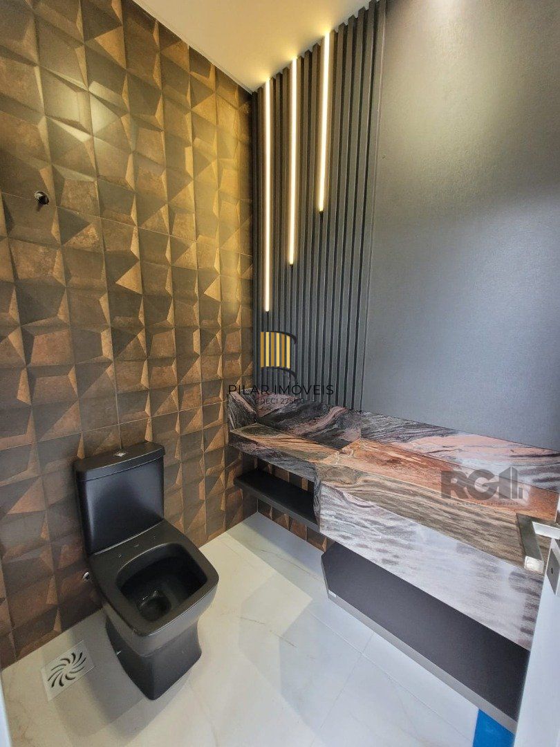 Casa de Condomínio 4 dormitórios no bairro Atlântida