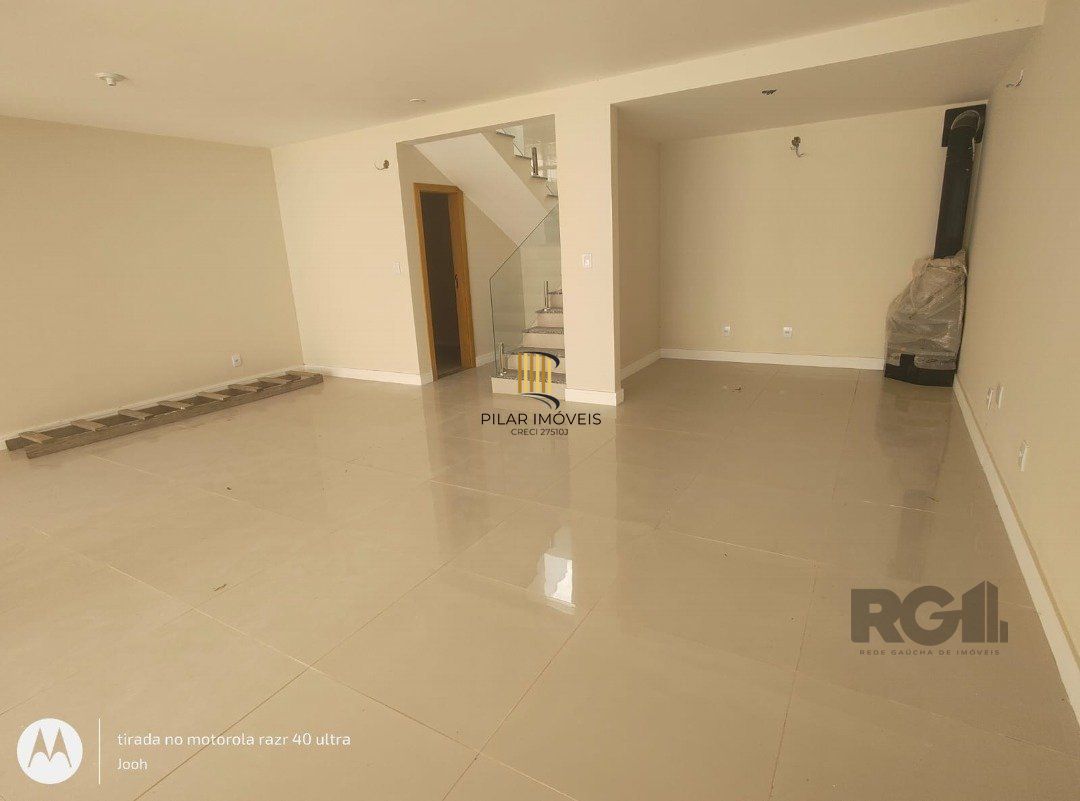 Casa em Condomínio fechado com 3 dormitórios no bairro Vila Nova em Porto Alegre, RS