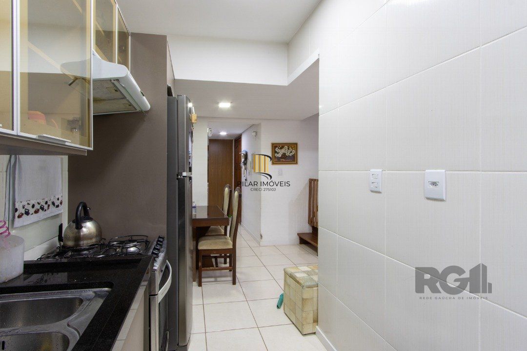 Casa de Condomínio 3 dormitórios no bairro Camaquã