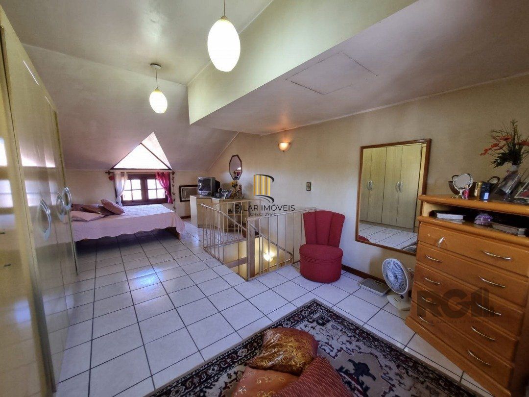 Casa de Condomínio 3 dormitórios no bairro Camaquã