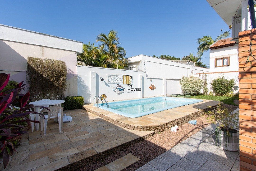 Casa 3 dormitórios no bairro Três Figueiras