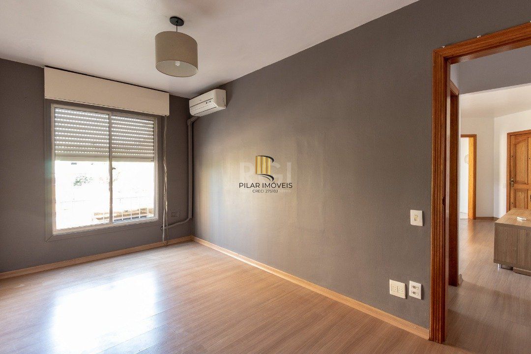 Apartamento de 1 dormitório, living, cozinha, área de serviço e banheiro social.