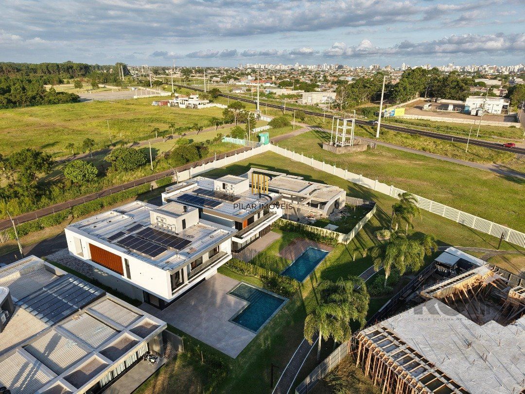Este belíssimo sobrado à venda no Capão Ilhas Resort,