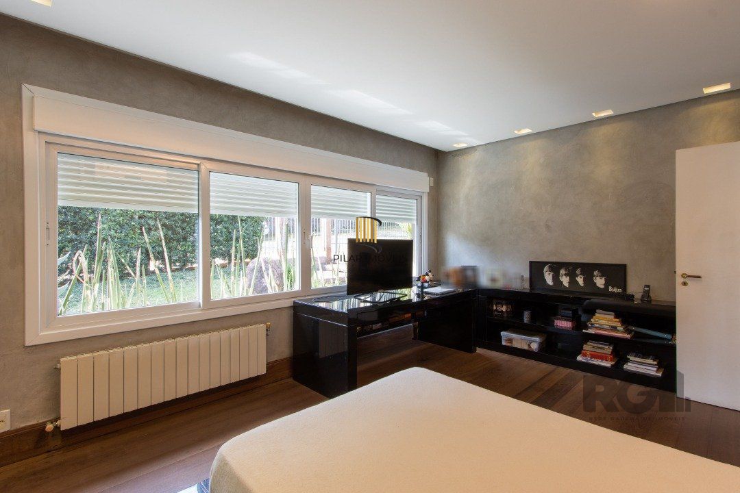 Casa deslumbrante vista do Guaiba, 3 dormitórios, sendo 1 suite master com closet e banheira de hidro com vista para o rio