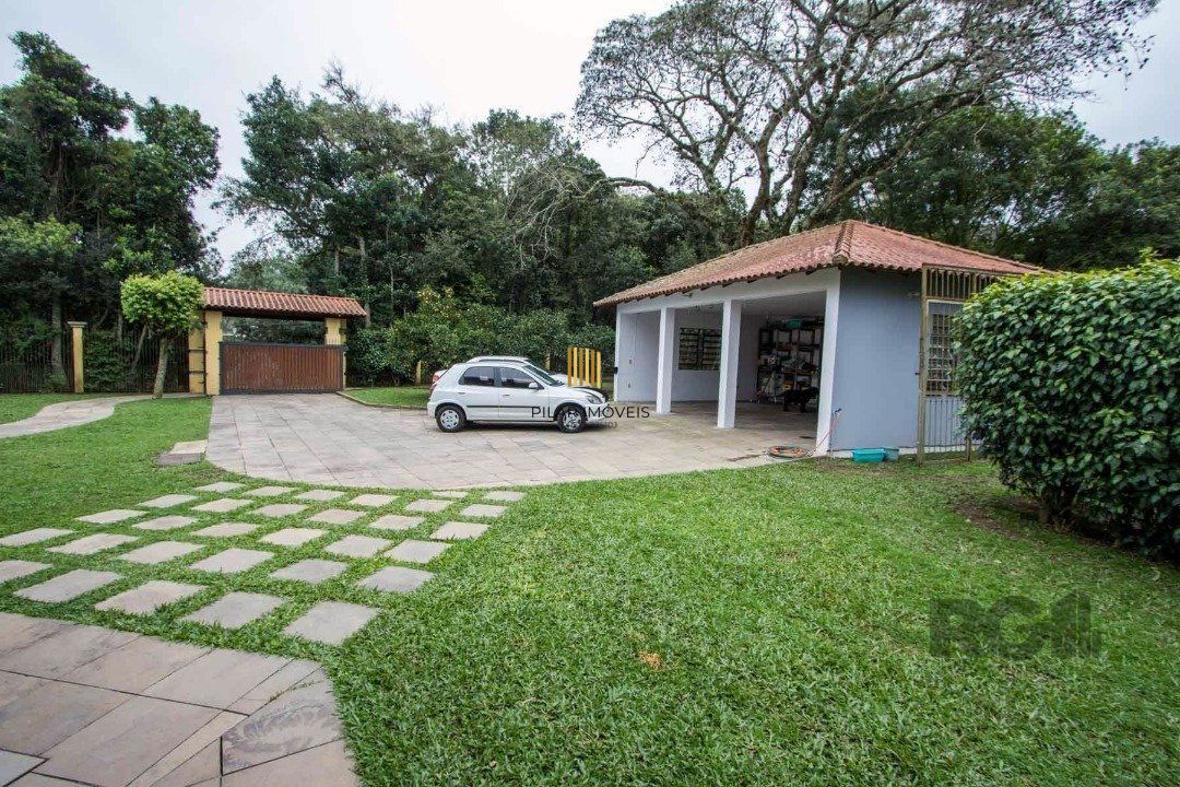 Sobrado com 6 suites, lareira, lavabo, pátio - Bairro Belém Velho
