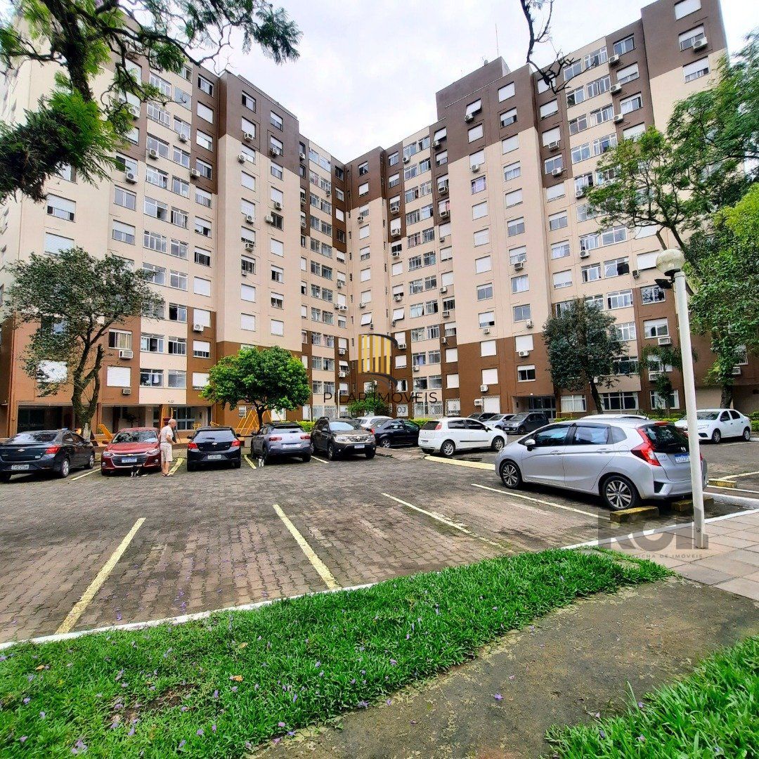 Apartamento de 1 dormitório, living, cozinha planejada, banheiro social.