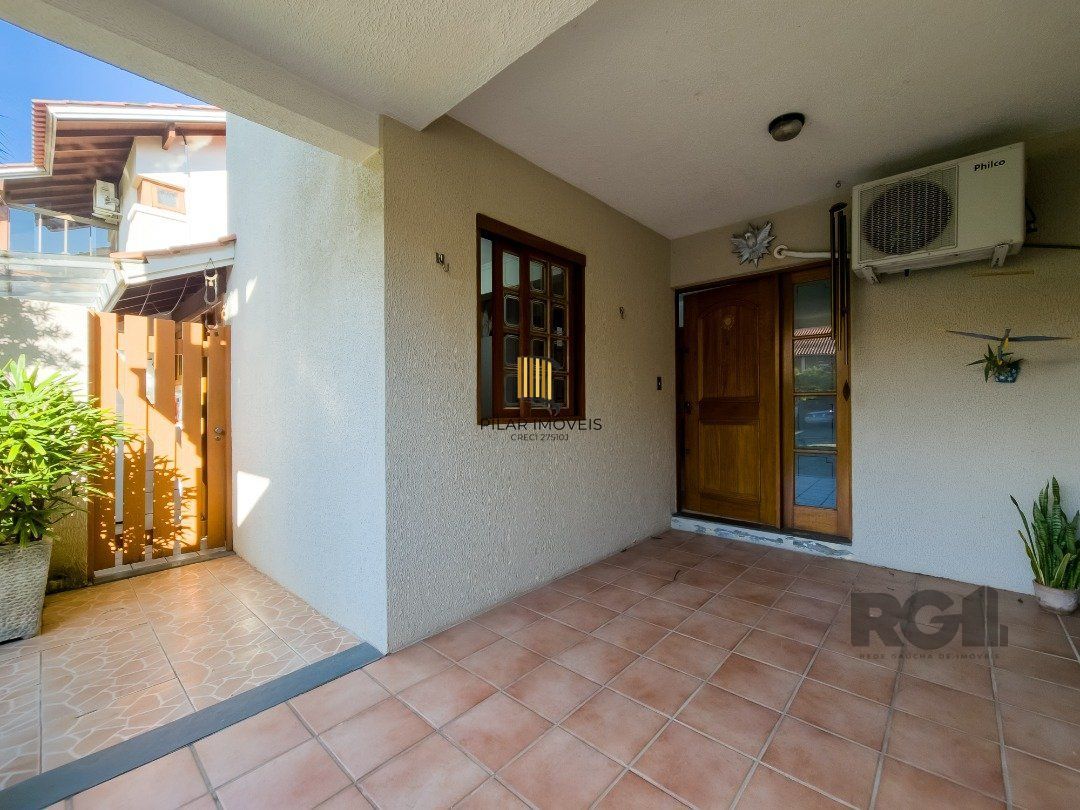Casa de Condomínio 3 dormitórios no bairro Cavalhada