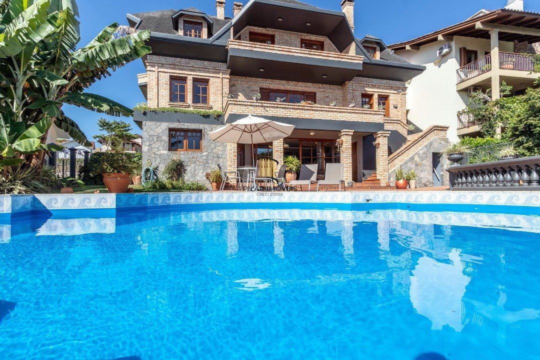 Casa Condominio para Venda - 559m², 4 dormitórios, sendo 3 suites, 3 vagas - Cavalhada
