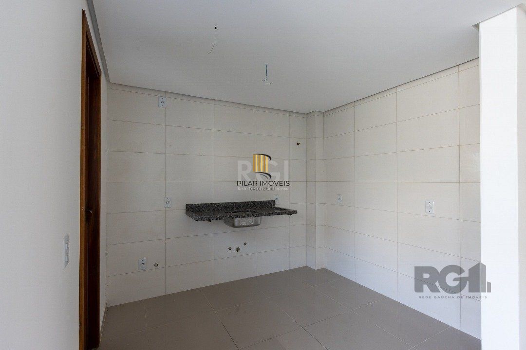 Casa 3 dormitórios no bairro Guarujá