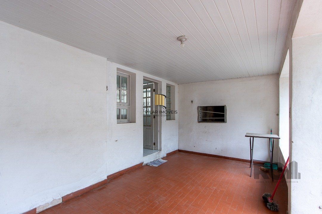 Casa 5 dormitórios no bairro Ipanema