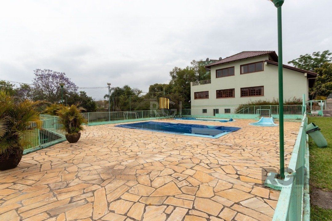 Casa de Condomínio 4 dormitórios no bairro Cavalhada