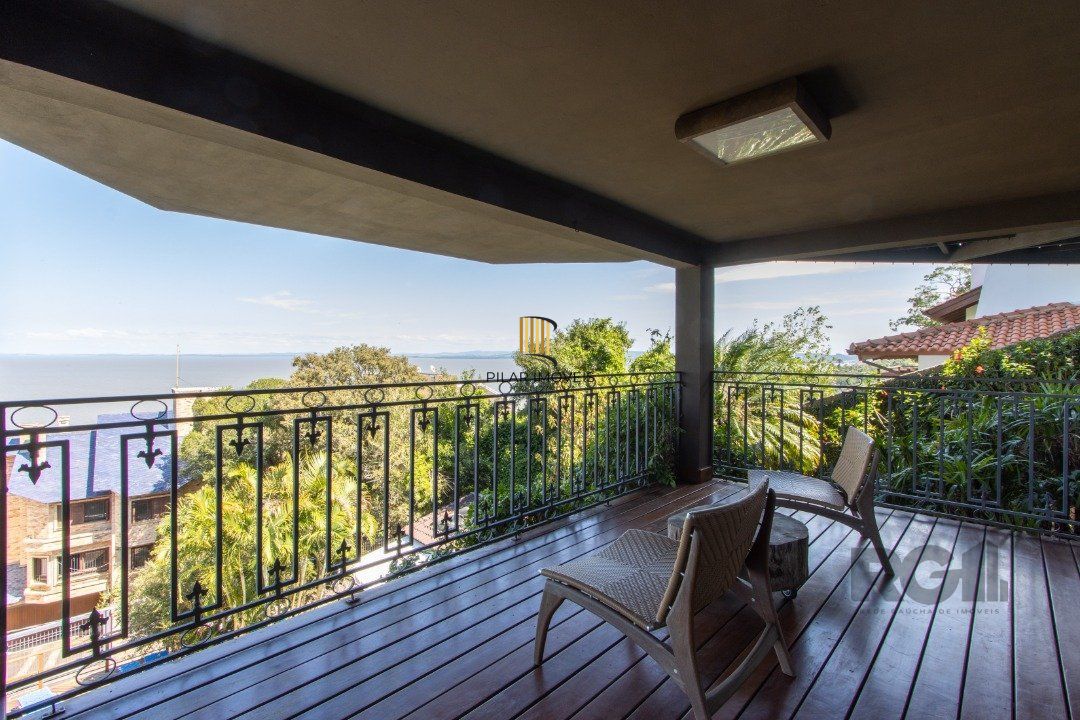 Casa deslumbrante vista do Guaiba, 3 dormitórios, sendo 1 suite master com closet e banheira de hidro com vista para o rio
