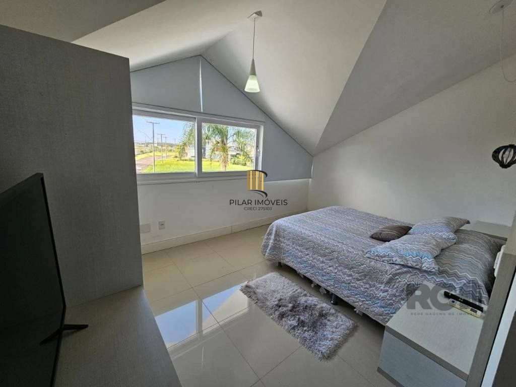 Casa de Condomínio 4 dormitórios no bairro Atlântida Sul