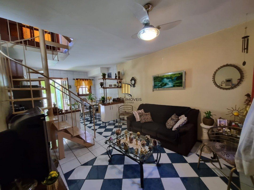 Casa de Condomínio 3 dormitórios no bairro Camaquã