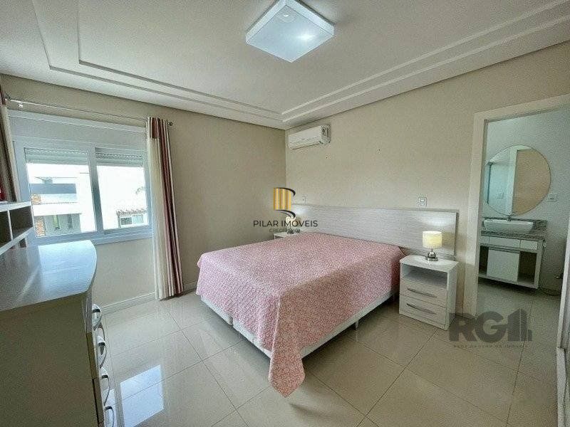 Casa de Condomínio 4 dormitórios no bairro Atlântida Sul