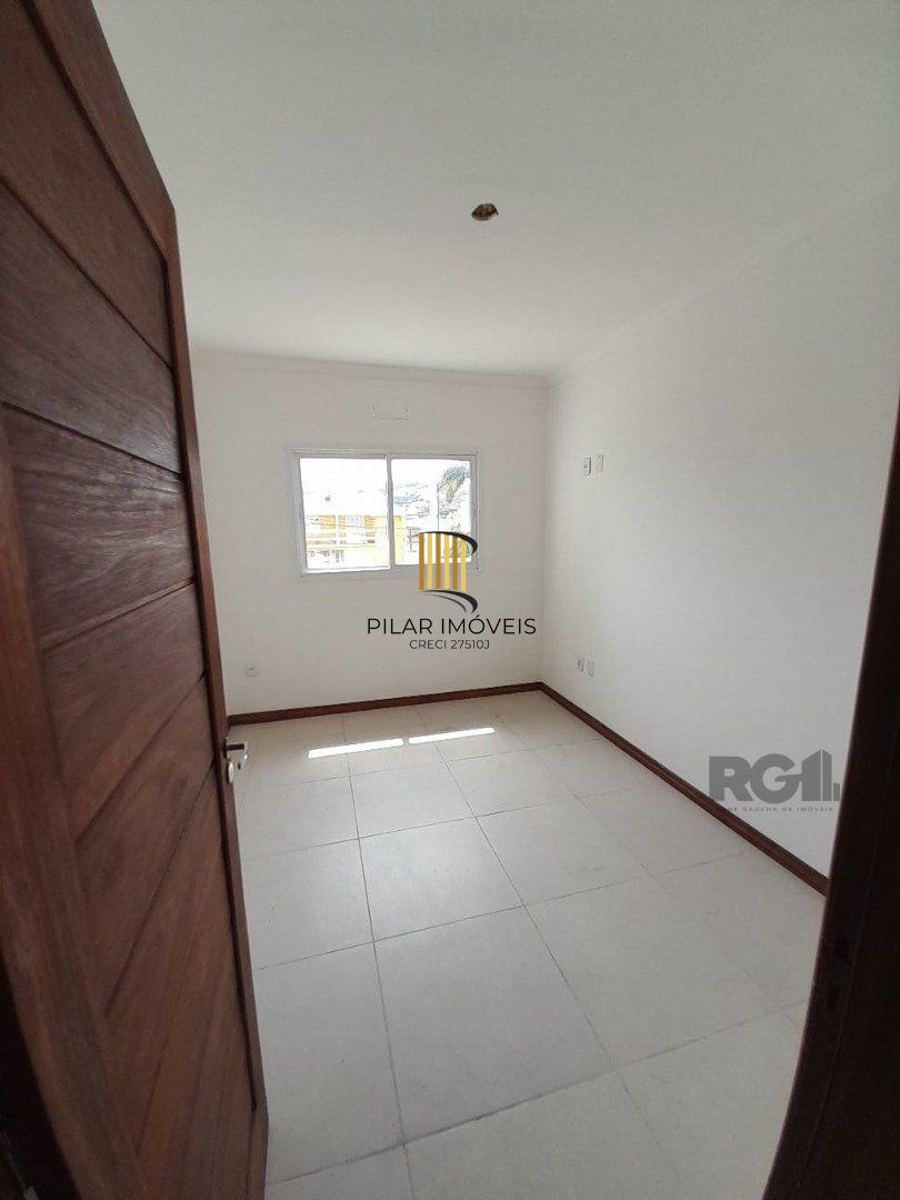 Casa 3 dormitórios no bairro Camaquã