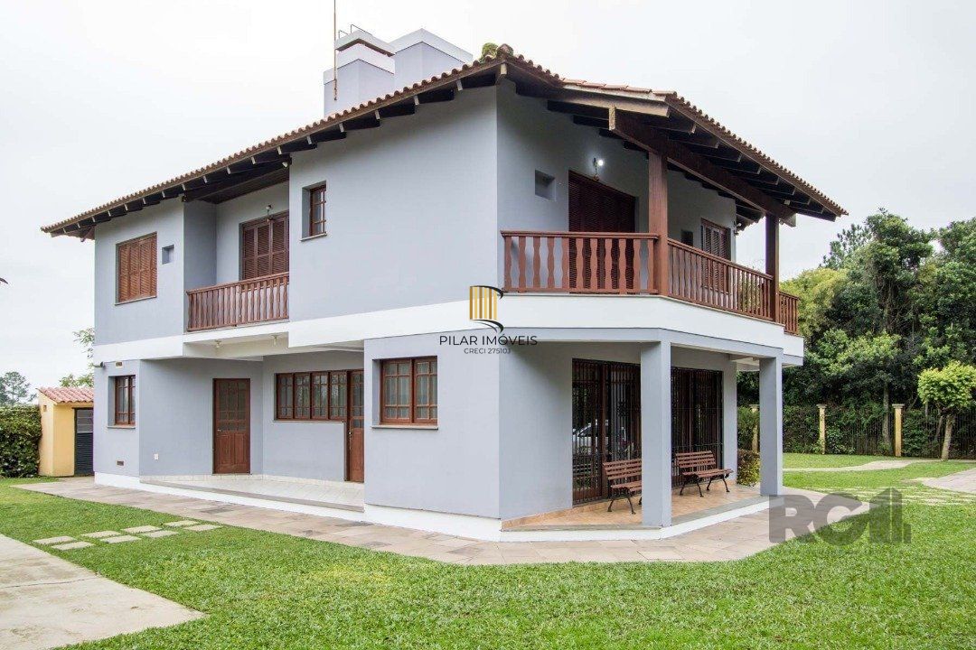 Sobrado com 6 suites, lareira, lavabo, pátio - Bairro Belém Velho