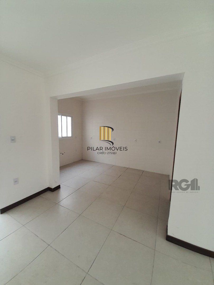 Casa 3 dormitórios no bairro Camaquã