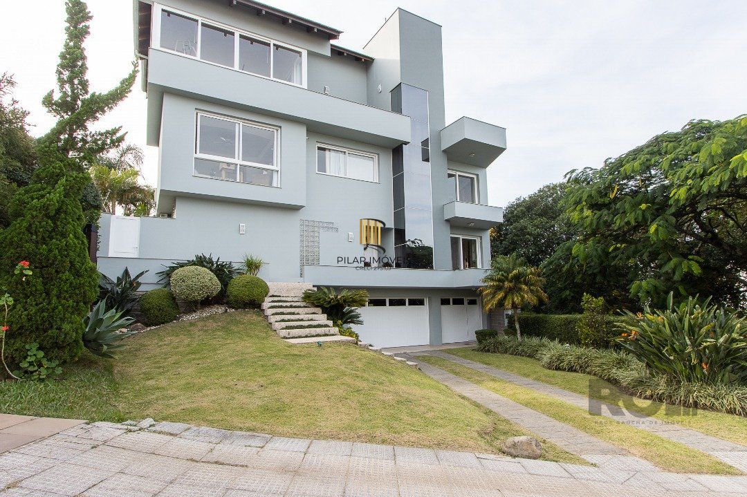 Casa de Condomínio 3 dormitórios no bairro Nonoai - Pilar Imóveis