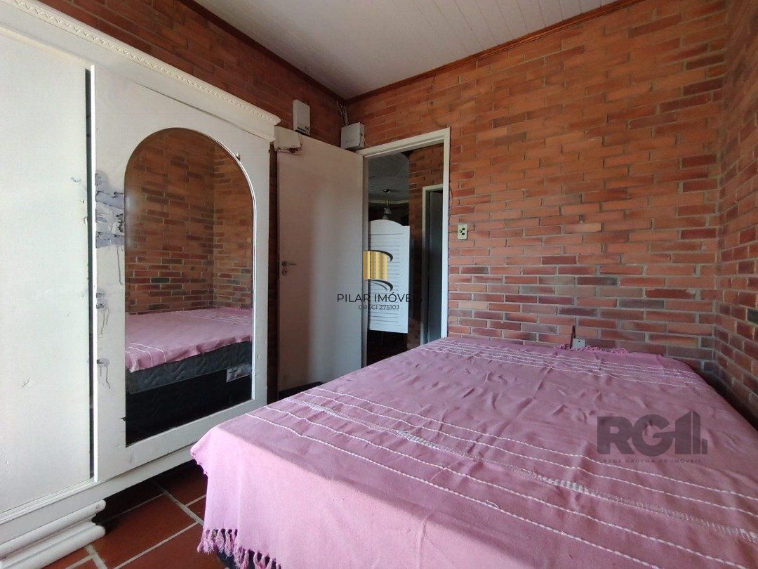 Casa 5 dormitórios no bairro Atlântida