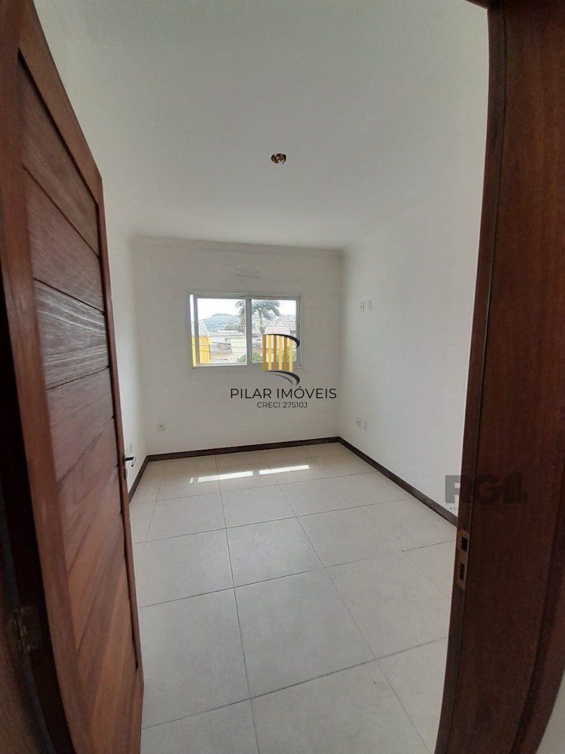 Casa 3 dormitórios no bairro Camaquã