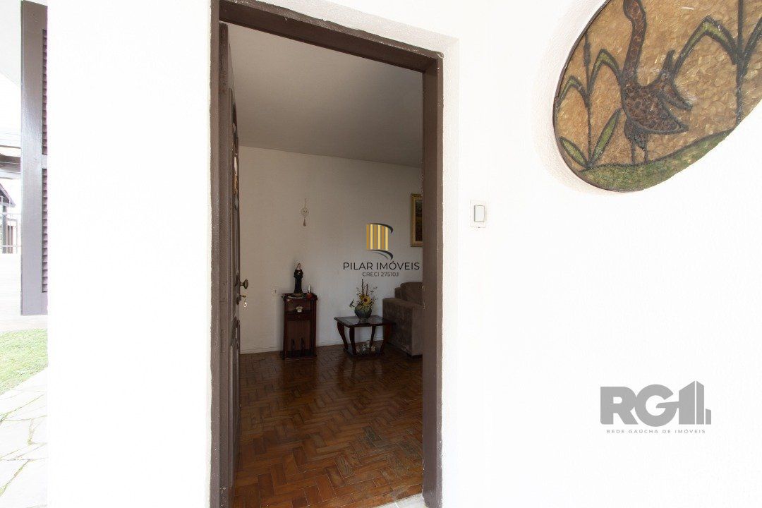 Casa 7 dormitórios no bairro Camaquã
