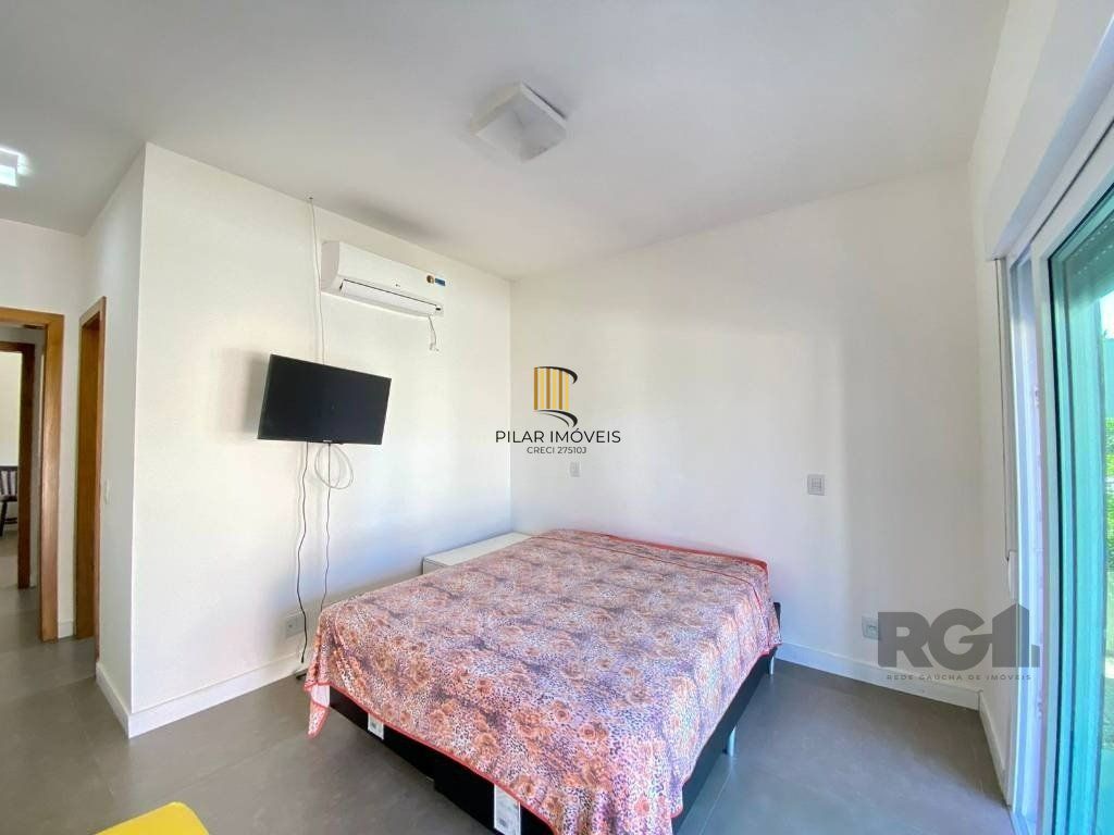 Casa a venda em Condomínio fechado na Beira mar de Atlântida Sul com 3 quartos e 164m²