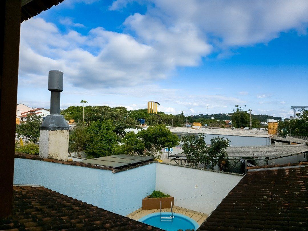 Casa de Condomínio 3 dormitórios no bairro Cavalhada