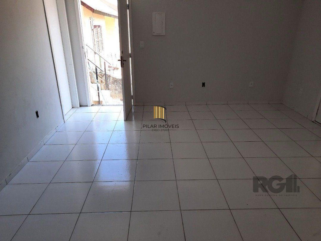 Oportunidade Imperdível: Prédio com 4 Apartamentos, Pátio e 2 Vagas de Garagem