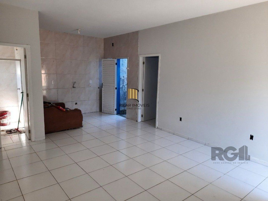 Oportunidade Imperdível: Prédio com 4 Apartamentos, Pátio e 2 Vagas de Garagem