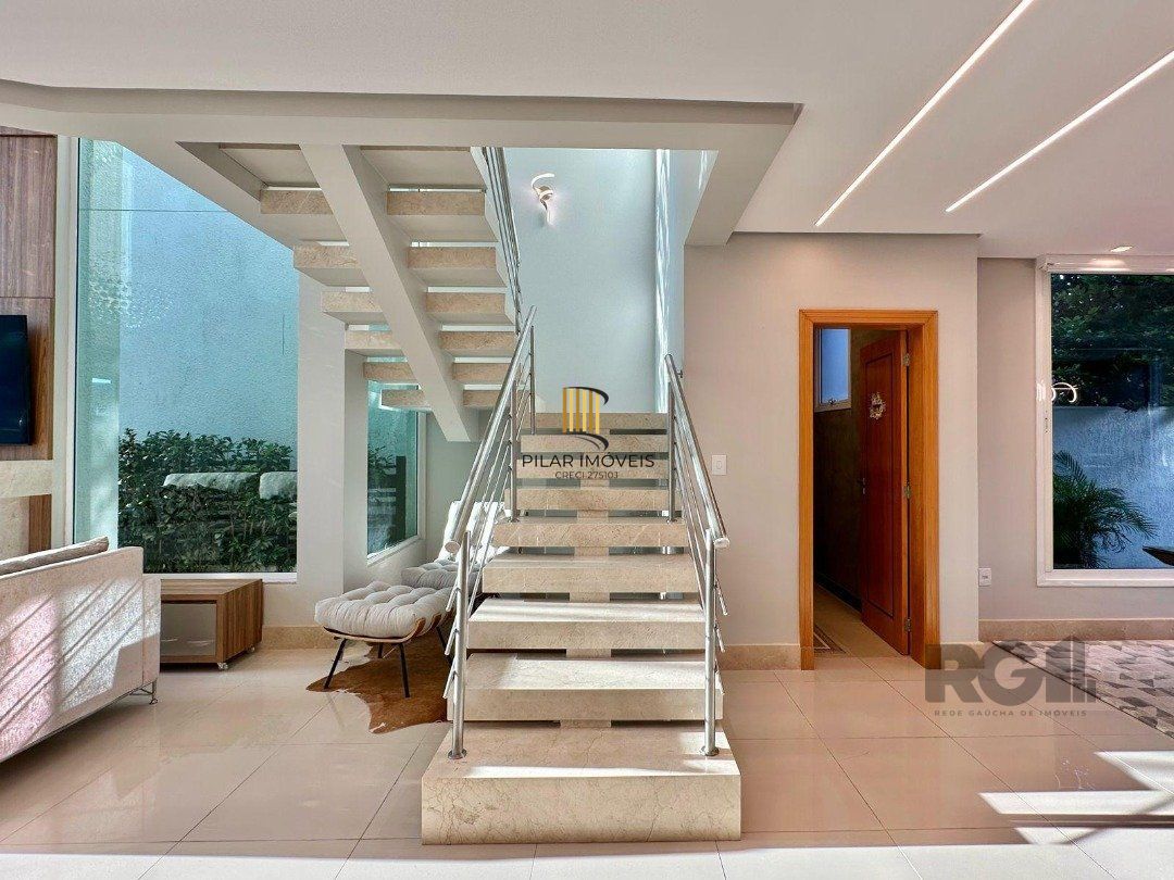 Casa de Condomínio 4 dormitórios no bairro Praia da Conceição