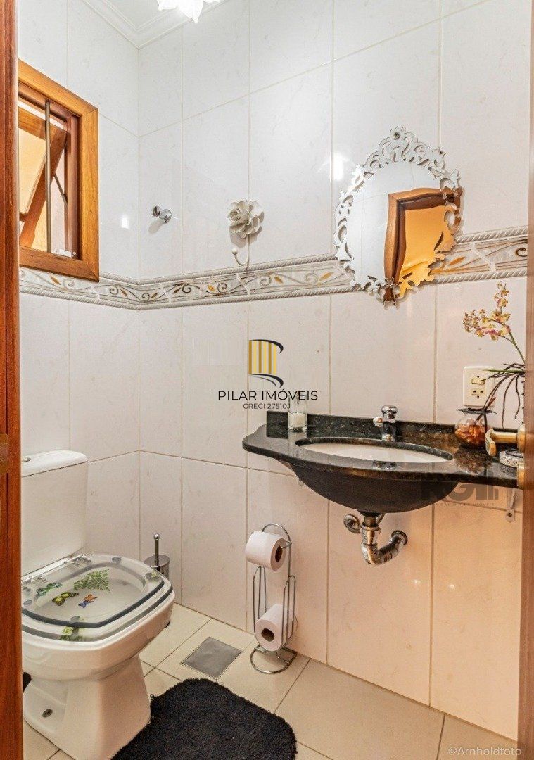 Casa 6 dormitórios no bairro Ipanema