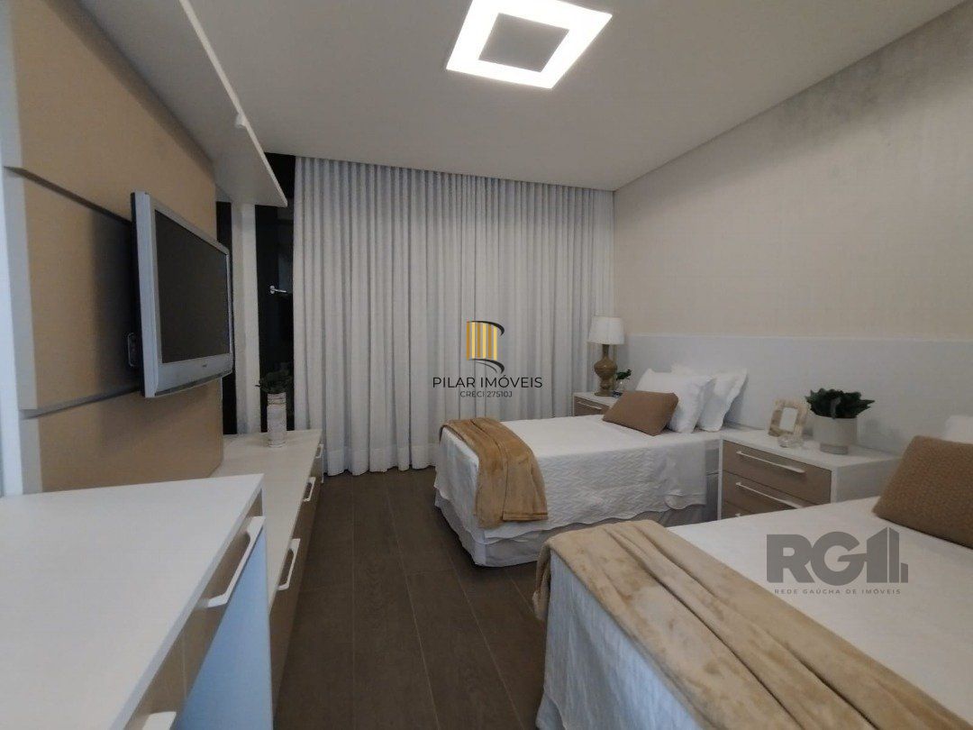Casa de Condomínio 5 dormitórios no bairro Atlântida