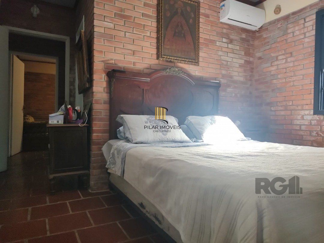 Casa 5 dormitórios no bairro Atlântida
