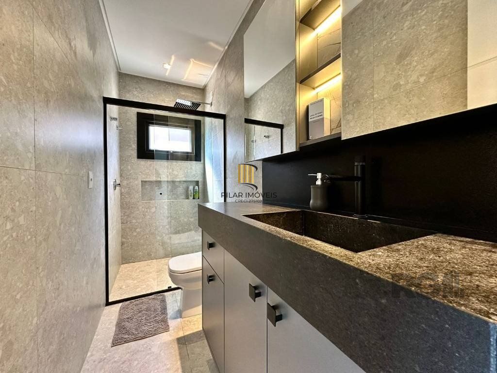 Casa de Condomínio 4 dormitórios no bairro Capão Novo