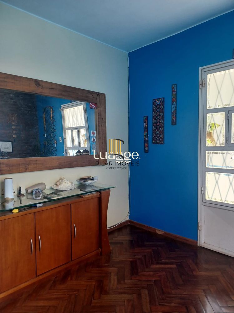 Casa 3 dormitórios no bairro Camaquã