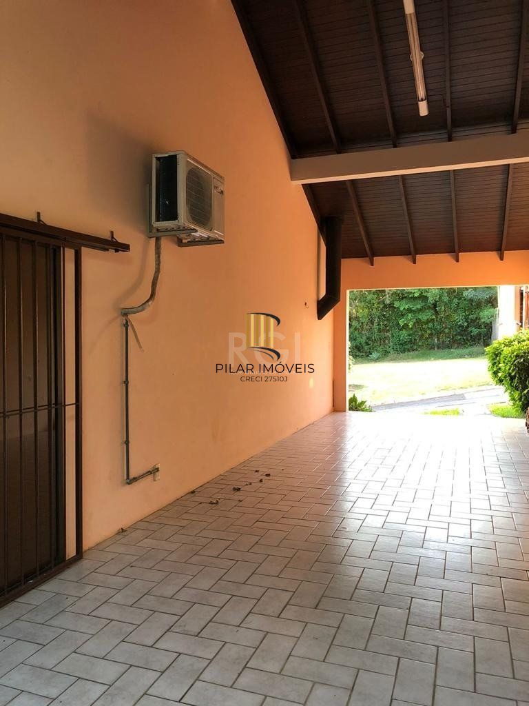 Casa de Condomínio 4 dormitórios no bairro Cavalhada